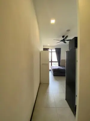 a room with a ceiling fan and a living room at Neu Suites KLCC by HMM Home in Kuala Lumpur
