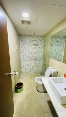 a bathroom with a toilet and a sink at Regalia SkyLux Studio in Kuala Lumpur