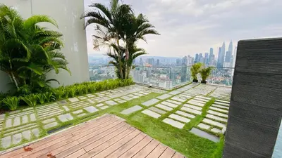 a view of the city from the roof of a building at RegaliaA Residences in Kuala Lumpur