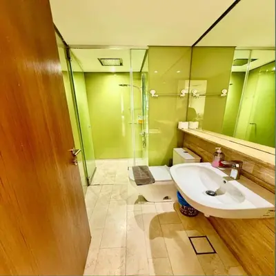 a bathroom with a sink and a shower and a toilet at KLCC Sky suites apartment bukit bintang in Kuala Lumpur