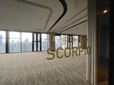 a conference room with a view of the city at IKON SUITE's A X O N BUKIT BINTANG in Kuala Lumpur