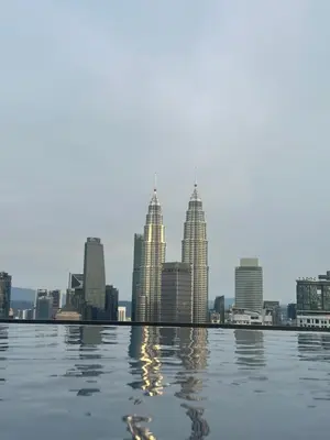 a view of a city skyline from the water at The Colony Infinitum KLCC Suits By Saidul in Kuala Lumpur