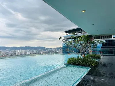 a swimming pool on the top of a building at KLCC City View luxury Suites in Kuala Lumpur