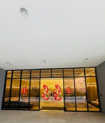 a store front with a large glass window at Agile Bukit Bintang TRX By Empire Suites in Kuala Lumpur