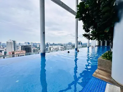 a swimming pool on the roof of a building at The Luxe Colony KLCC By KUALA LUMPUR in Kuala Lumpur