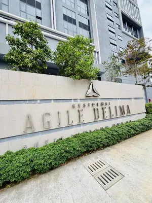a sign in front of a building at Agile Bukit Bintang TRX By RUP Suites in Kuala Lumpur