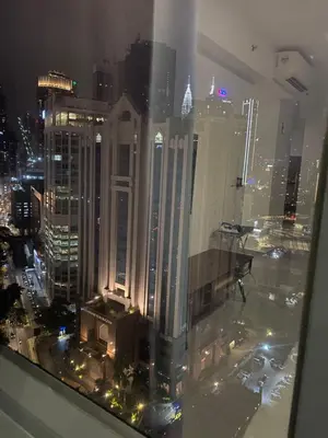 a view of a city at night from a skyscraper at agile residence in Kuala Lumpur
