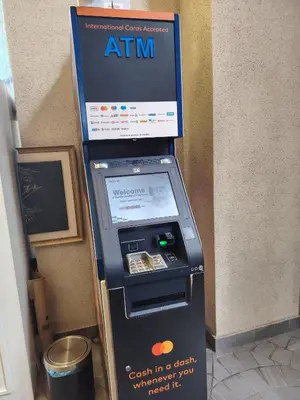 an atm machine with a box on top of it at Scarletz Suites KLCC by near twin tower in Kuala Lumpur