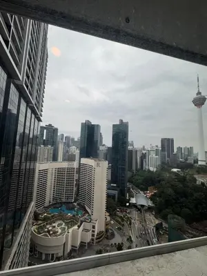 a view of a city skyline from a skyscraper at Oras Suites At platinum KLCC in Kuala Lumpur