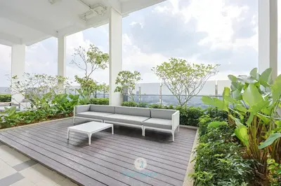 a living room with a couch and a table at Met 1 Mont Kiara - 3 min to Publika Mall - 2B2B for 4 in Kuala Lumpur