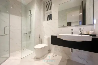 a bathroom with a toilet and a sink and a shower at Met 1 Mont Kiara - 3 min to Publika Mall - 2B2B for 4 in Kuala Lumpur