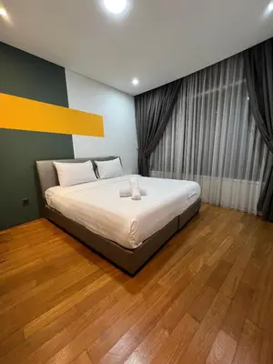 a bedroom with a bed in a room at Vortex in Kuala Lumpur