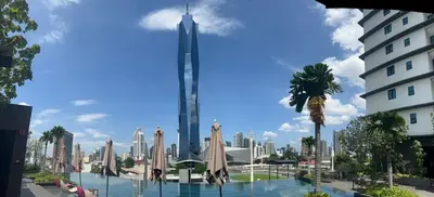 a view of the burj khalifa and the city at KL Sky Suite By Opus Residence in Kuala Lumpur