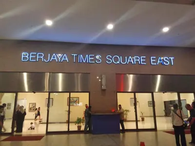 a store front with people standing outside of it at Healthy suite At Times Square KL in Kuala Lumpur