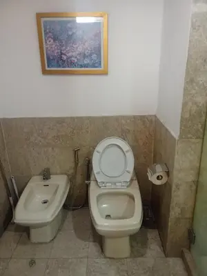 a bathroom with a toilet and a sink at Healthy suite At Times Square KL in Kuala Lumpur