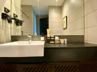 a bathroom with a white sink and a mirror at Opus Residence 1R1B Pinwu 118 view|Balcony|LRT in Kuala Lumpur