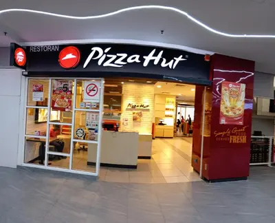 a pizza hut store in a shopping mall at Town suites Times Square in Kuala Lumpur
