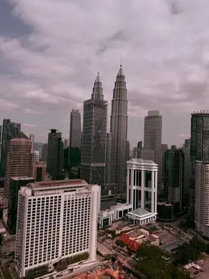 a view of a city skyline with tall buildings at Poshpack Skyline Hostel in Kuala Lumpur