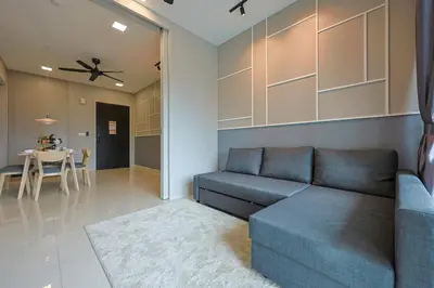a living room with a couch and a table at Elegant Skyline Suite # Datum Jelatek near KLCC in Kampong Datok Keramat
