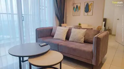 a living room with a couch and a table at trion in Kuala Lumpur