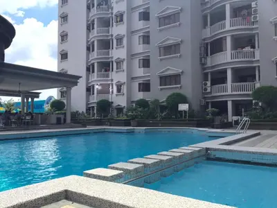 a swimming pool in front of a building at The Forum Kuala Lumpur in Kuala Lumpur