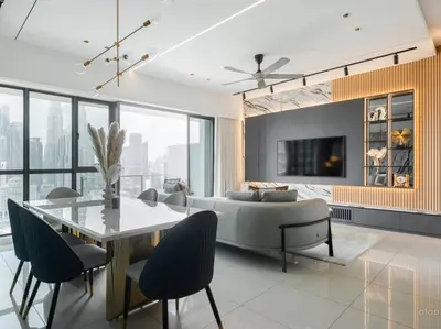 a living room with a bed and a table at Prime Location KLCC - next to MRT in Kuala Lumpur