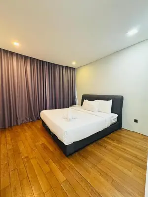 a bedroom with a large bed in a room at Vortex suites Near Klcc By I&J in Kuala Lumpur