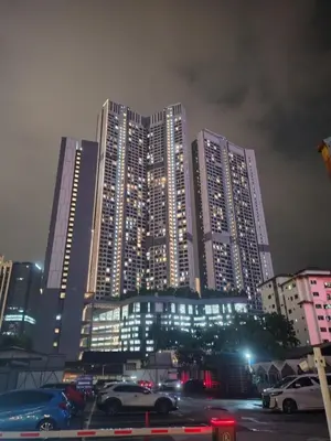 a group of tall buildings in a city at night at Agile suits of Kuala Lumpur in Kuala Lumpur