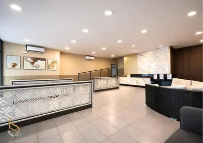 a waiting area of a hospital with a waiting room at LUXORA SUITE's REIZZ RESIDENCE in Kuala Lumpur