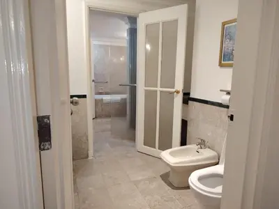 a bathroom with a toilet and a sink at Time Square Mountain View Apartment KL in Kuala Lumpur