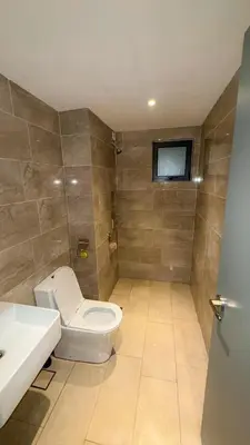 a bathroom with a toilet and a sink at M Arisa Sentul by A&T in Kuala Lumpur