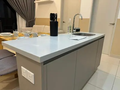 a kitchen with a white counter top and a sink at TRION KL, Jalan Chan Sow Lin, Kuala Lumpur in Kuala Lumpur