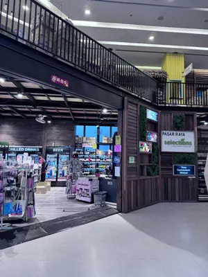 a store with a staircase in a shopping mall at Mercu Summer Suites KLCC by Jk Privy Homes - Entire Studio in Kuala Lumpur