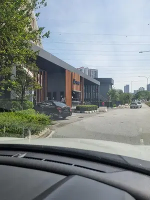 a view from a car of a building on a street at Awani3 Homestay, Setapak, KL in Kuala Lumpur