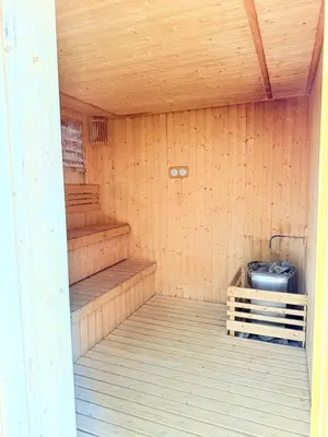 an empty sauna with wooden walls and wooden floors at Luxury Axon Residence Bukit Bintang KLCC Pavilion By EQZ in Kuala Lumpur