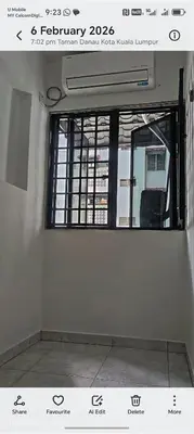 a window in a room with a white wall at Hot Spring Residential in Kuala Lumpur