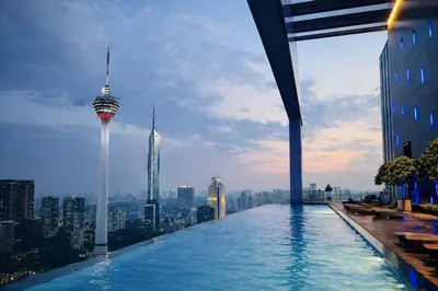 a infinity pool with a view of the city at Platinum Executive Suites Kuala Lumpur in Kuala Lumpur