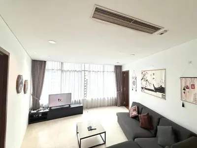 a living room with a couch and a laptop in it at Vortex Suites klcc by Natasya in Kuala Lumpur
