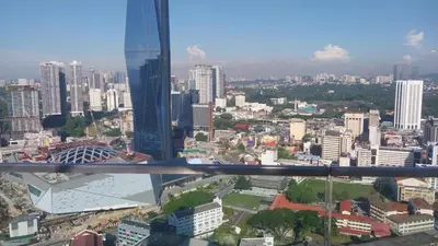 a view of a city from a skyscraper at Robertson By Sahara Urban Oasis in Kuala Lumpur