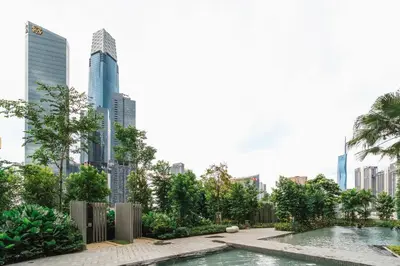 a swimming pool in a city with tall buildings at Earthy 2BR @ Agile BB | Wi-Fi + Netflix in Kuala Lumpur