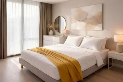 a bedroom with a large bed and a mirror at Trion Kuala Lumpur in Kuala Lumpur