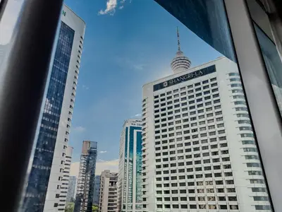 a view of a tall building in a city at VORTEX SUITES KLCC By SKYLINE in Kuala Lumpur