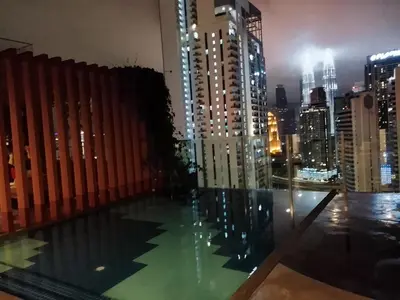 a view of the city from the roof of a building at Majestic Residence Klcc By DIVINA in Kuala Lumpur