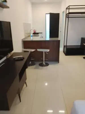 a living room with a desk and a chair in it at Kuala Lumpur Majestic Suites KLCC in Kuala Lumpur