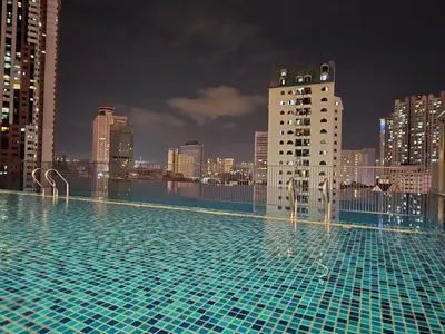 a swimming pool on top of a city skyline at Chambers Residences Kuala Lumpur BY BJS in Kuala Lumpur