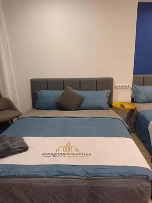 a bed in a room with a sign on it at Fahrenheit 88 4R in Kuala Lumpur