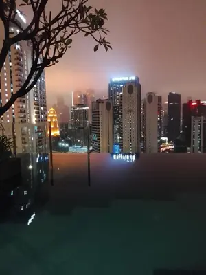 a view of a city skyline at night at Majestic Suites Quill Mall Apartment in Kuala Lumpur