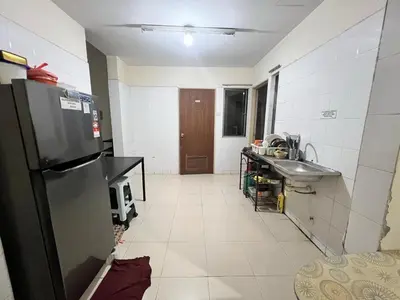a kitchen with a sink and a refrigerator at Male Room at Berjaya Times Square, KL City Centre in Kuala Lumpur