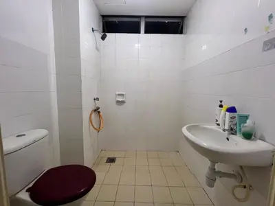 a bathroom with a toilet and a sink at Male Room at Berjaya Times Square, KL City Centre in Kuala Lumpur