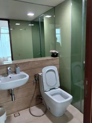 a bathroom with a toilet and a sink at Vortex suites Klcc near KL in Kuala Lumpur